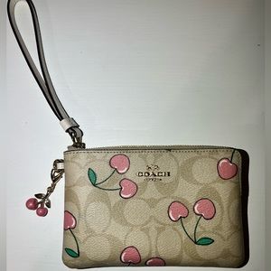 Coach- Zip Wristlet